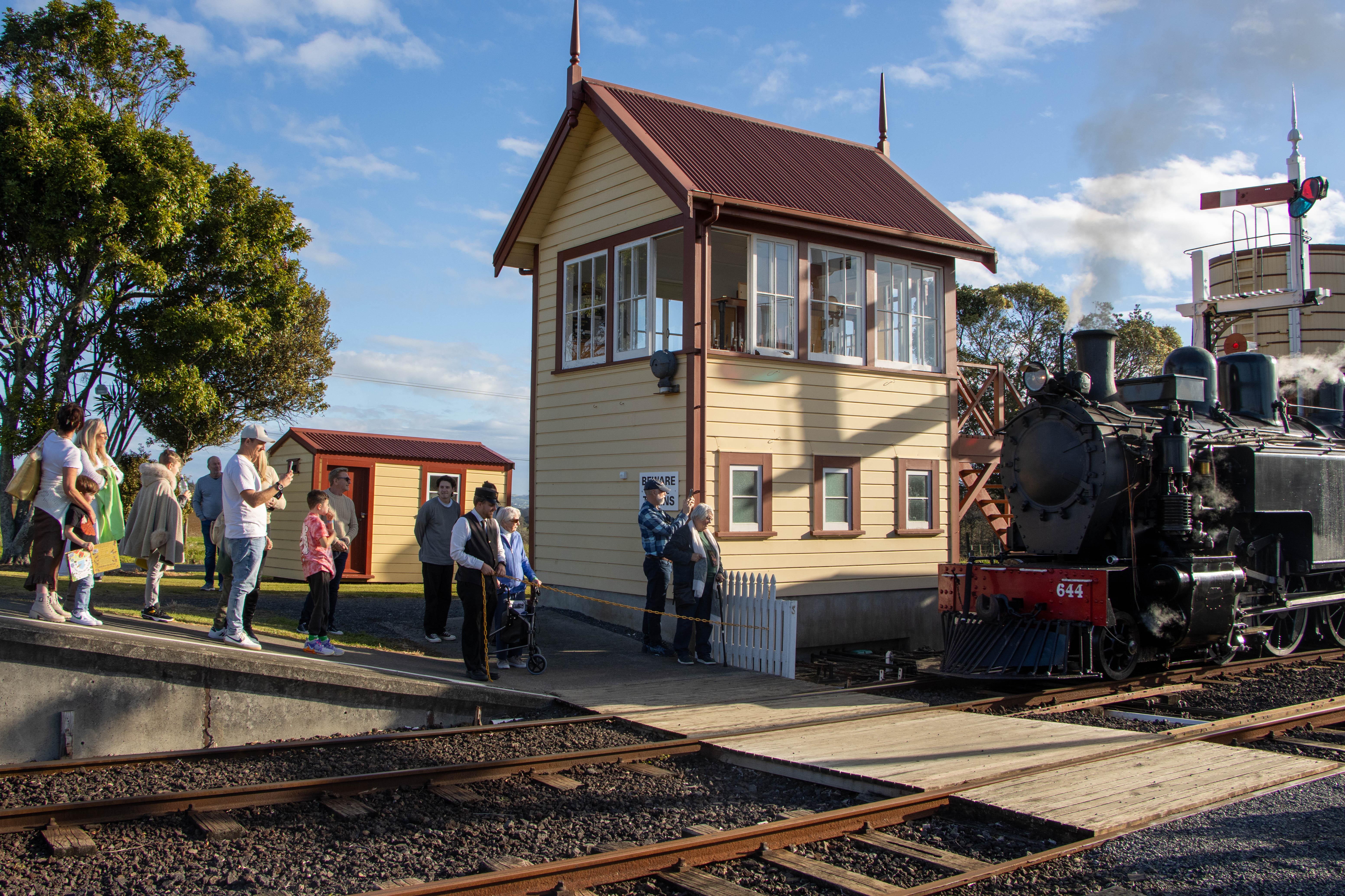 Steam locomotive, passengers, crew and heritage railway scenes