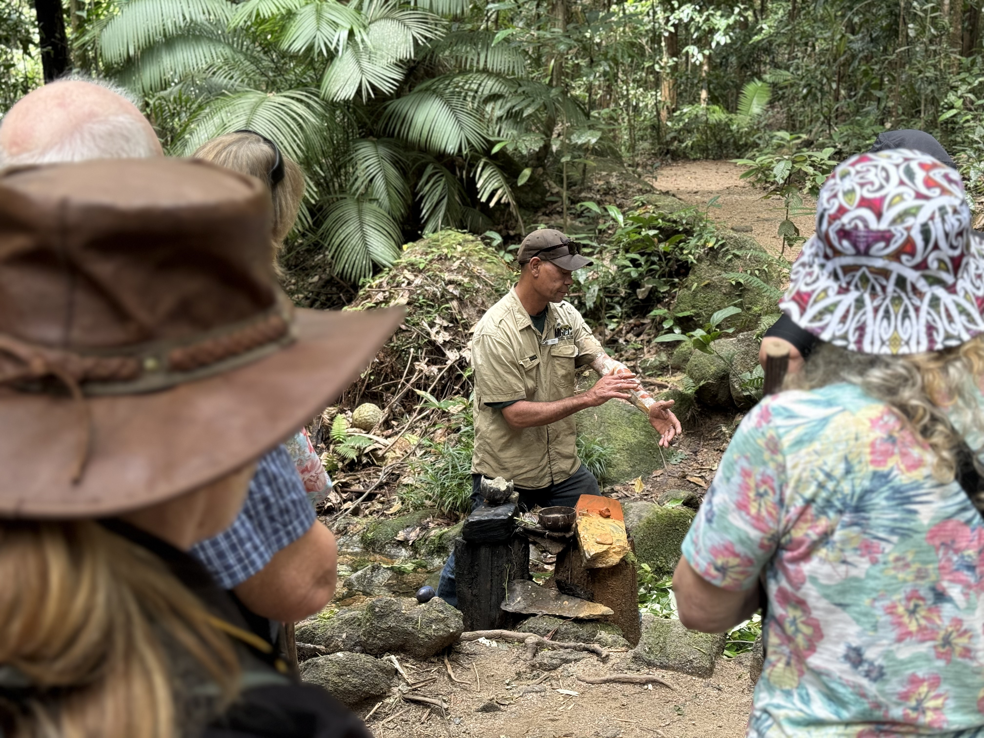 GVR tour guests experiencing a Welcome to Country at Mossman Gorge