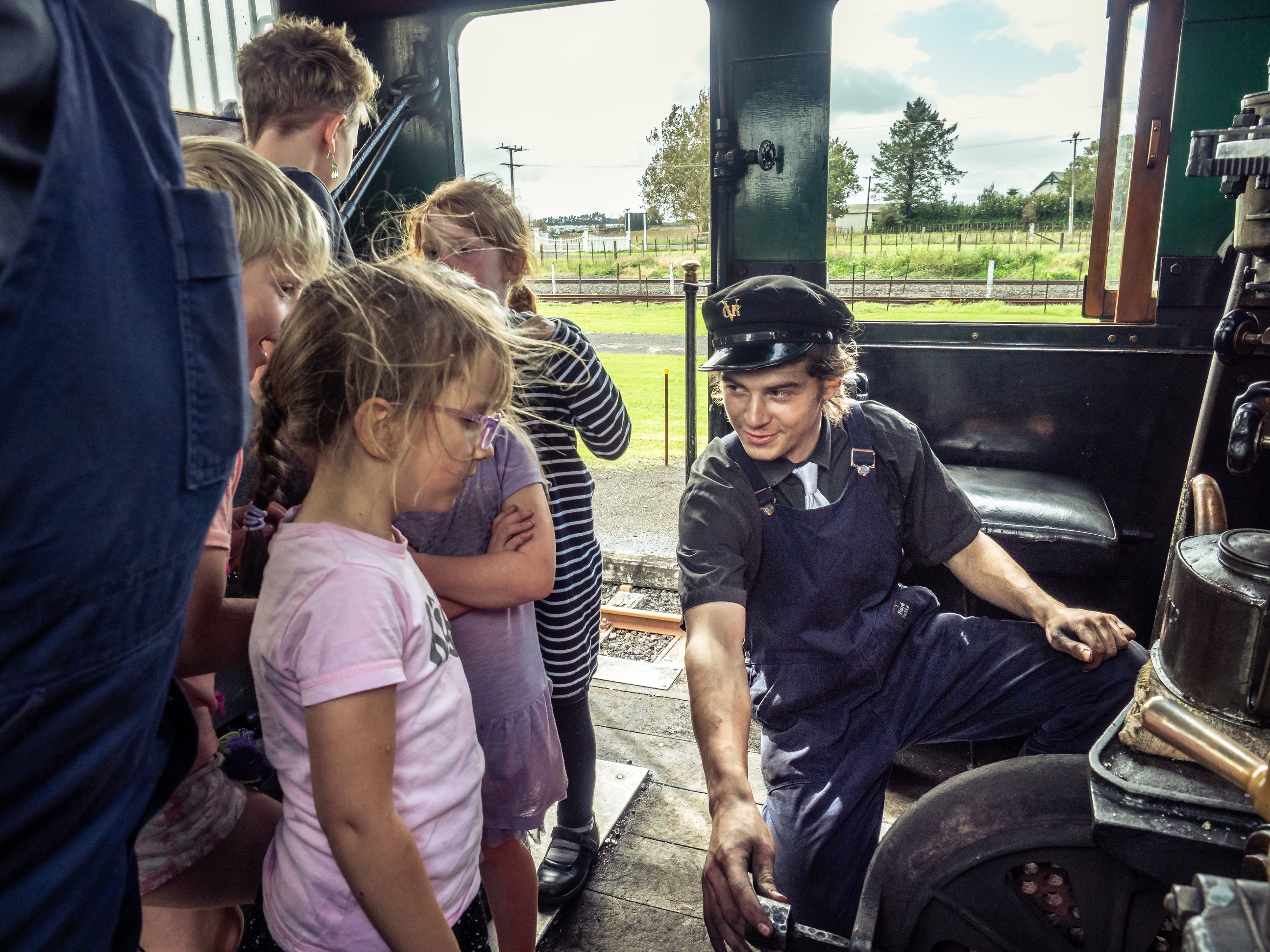 View from a heritage train across green countryside on the Glenbrook Vintage Railway